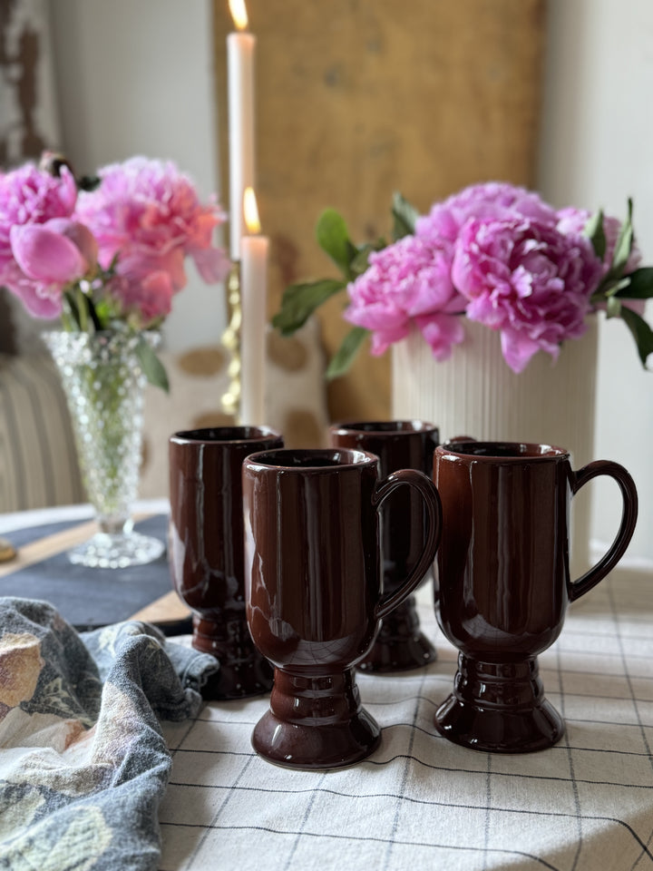 FOUR LARGE BROWN MUGS