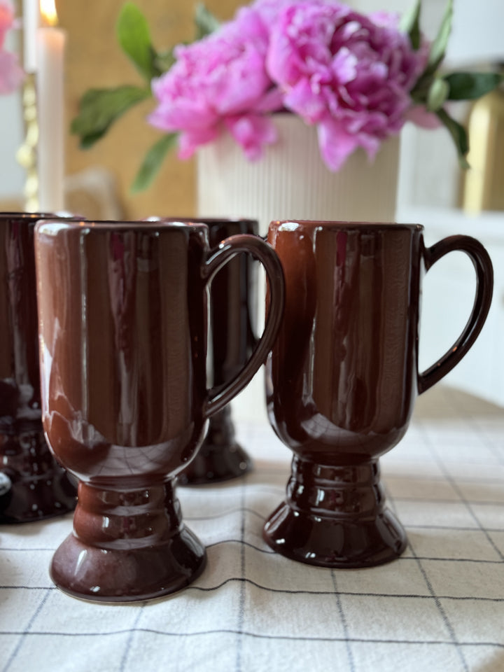 FOUR LARGE BROWN MUGS